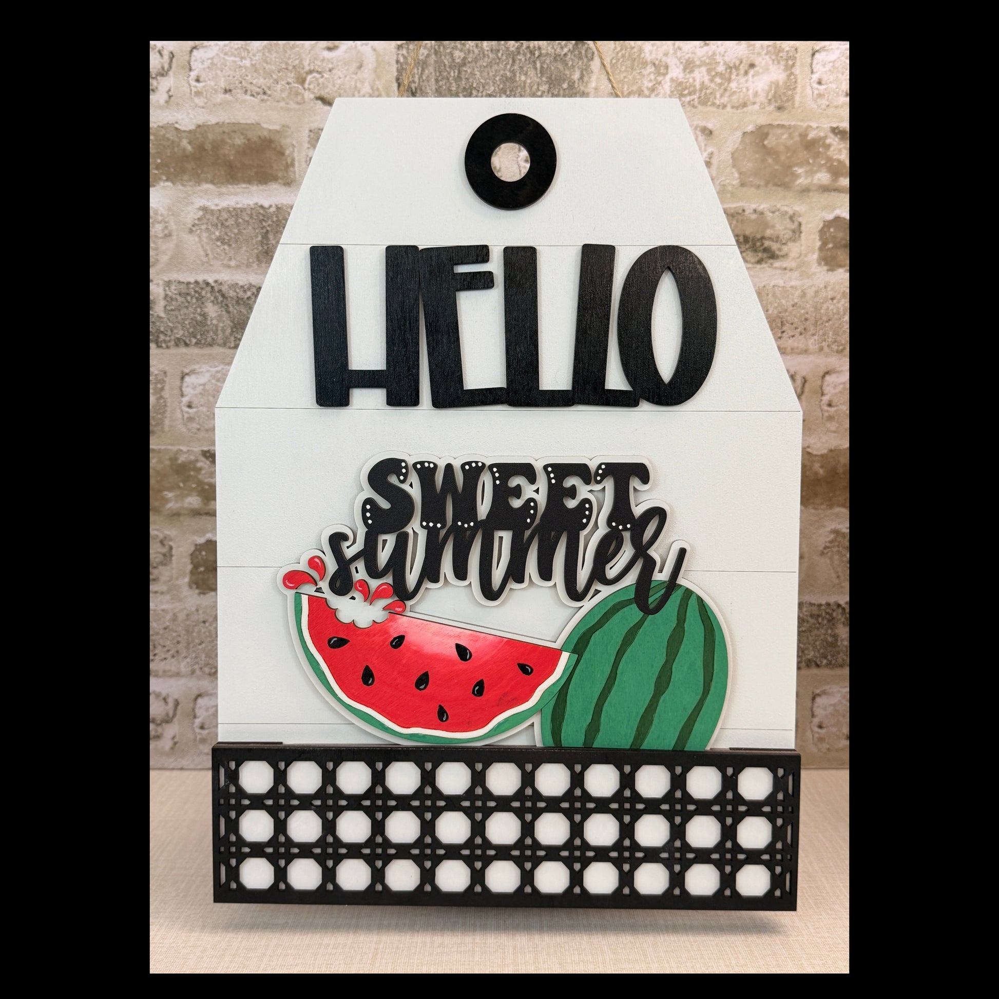 Decorative sign with 'Hello Sweet Summer' text and watermelon graphics on a white background.